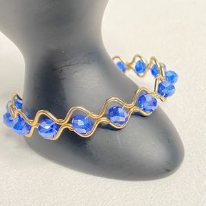 Bangle Bracelet Gold Tone Wire Encasing True Blue Faceted Rhinrstones